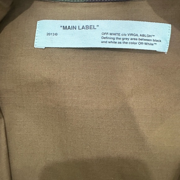 Off-White Camouflage Jacket with Patches and Orange Accents - Picture 6 of 12